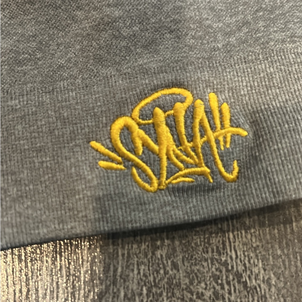 Syna World Grey Beanie – Yellow Embroidered Logo – Streetwear